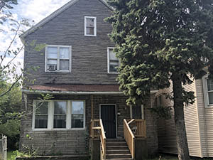 Front exterior view of 8138 S. Escanaba, Chicago section 8 invesment property