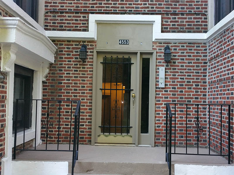 Exterior view of front door of 4553 S. Michigan section 8 condo building
