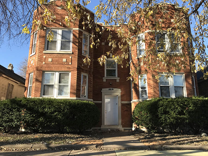 Front exterior view of 7332-34 S. May section 8 investment Property